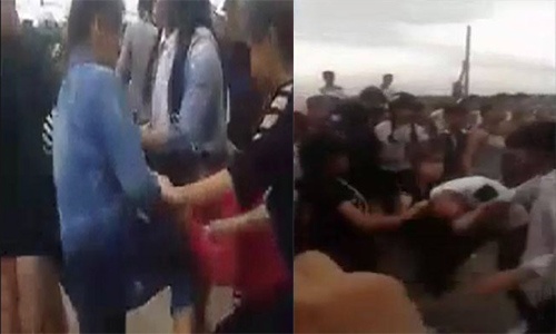 Hai cô gái bị nhóm nữ sinh đánh hội đồng bằng tuýp sắt
