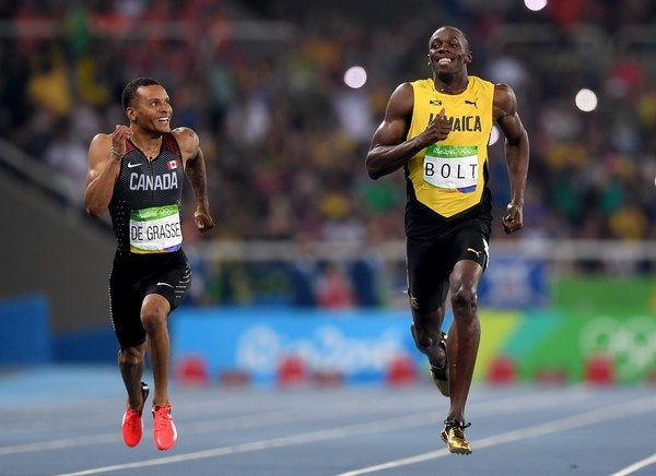 Nụ cười Usain Bolt và chân giá trị tượng đài