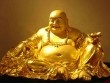 Đây là lý do nhà giàu thích đặt tượng Phật Di Lặc ôm thỏi vàng ở phòng khách