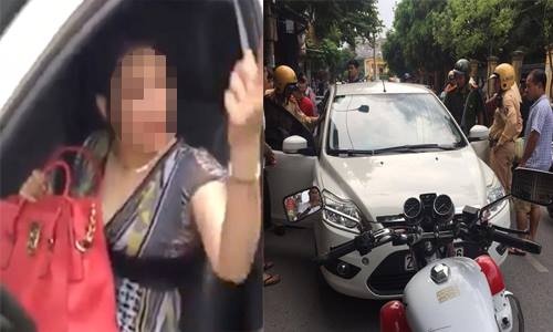 Nữ Việt kiều cố thủ trong ôtô khi bị cảnh sát thổi còi