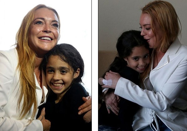 Lindsay Lohan tươi rói đi từ thiện sau tai nạn đứt nửa ngón tay