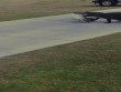 Cá sấu khổng lồ ngậm mồi nghênh ngang trên sân golf