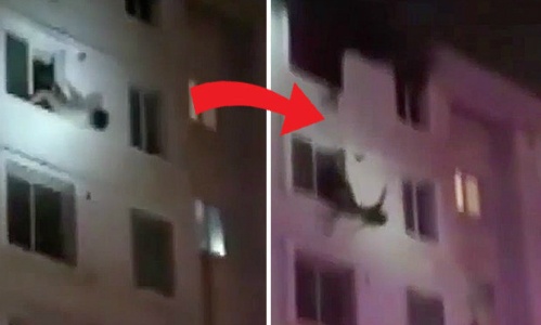 Lính cứu hỏa vươn tay giữ chân cô gái rơi từ tầng 6